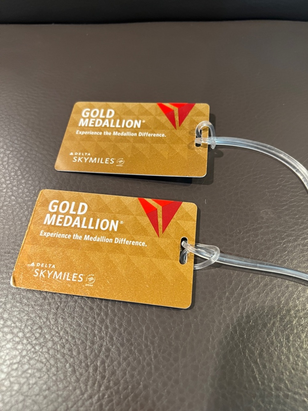 Delta Skymiles gold medallion luggage tags